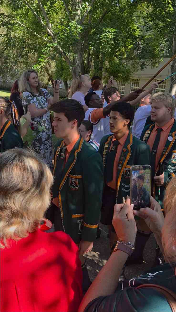 Parents and learners cheer the Matrics after the gate