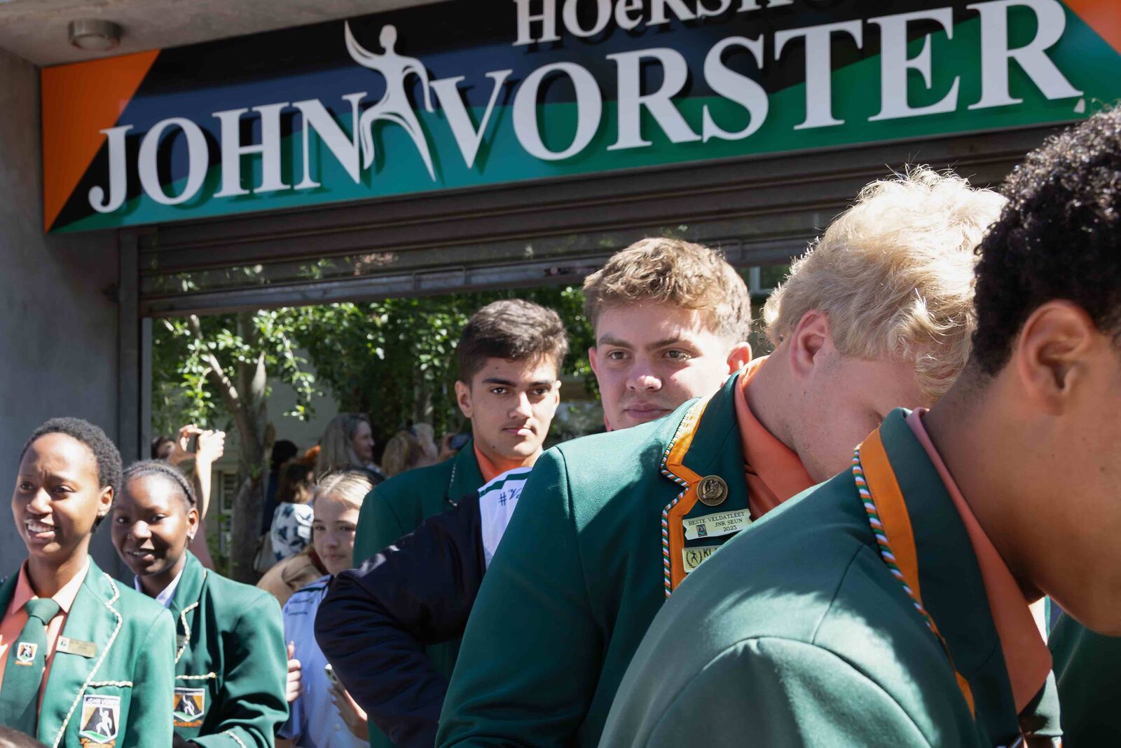Matrics under the John Vorster sign at the school gate