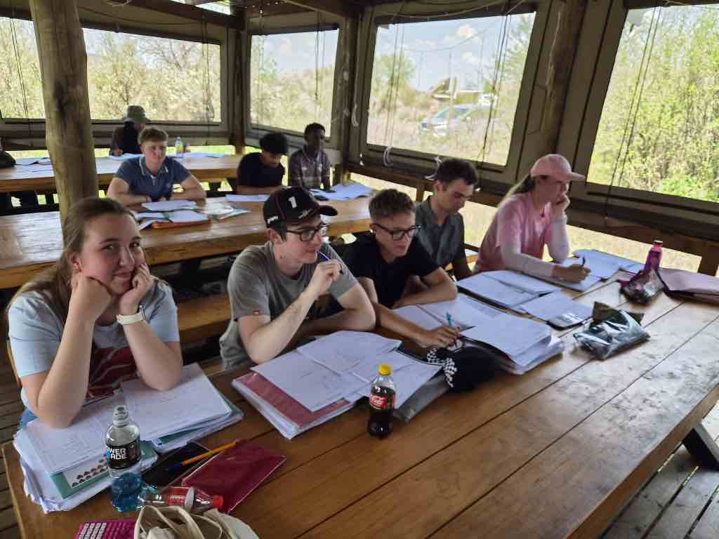 Learners working through past papers at the 2026 Mathematics Camp